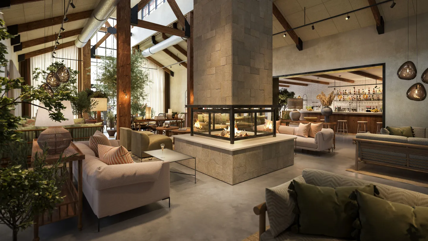 Stort rum med öppen spis i mitten